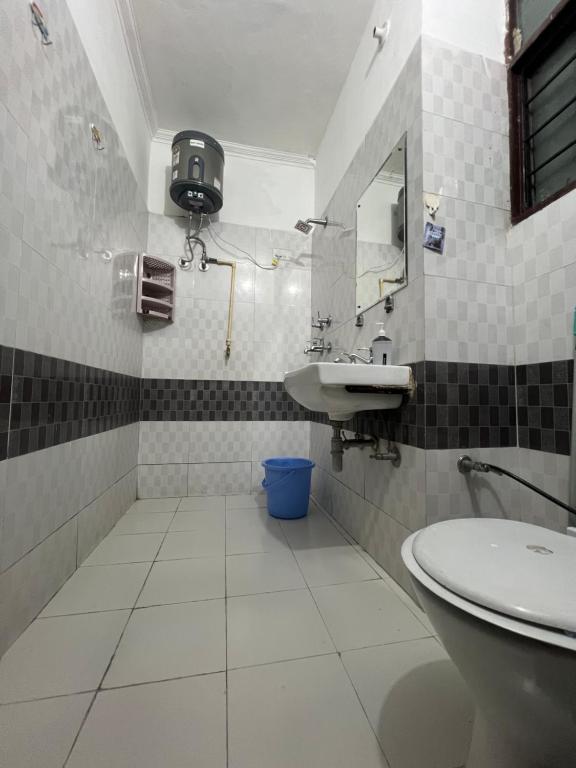 Et badeværelse på ComfortStay 1BHK