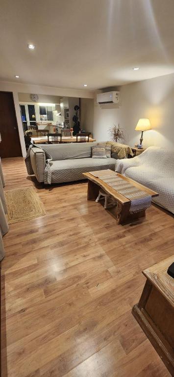 a living room with two couches and a coffee table at Moramay in Punta del Este