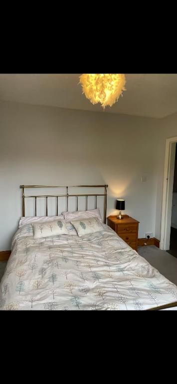 Giường trong phòng chung tại Sua Deer