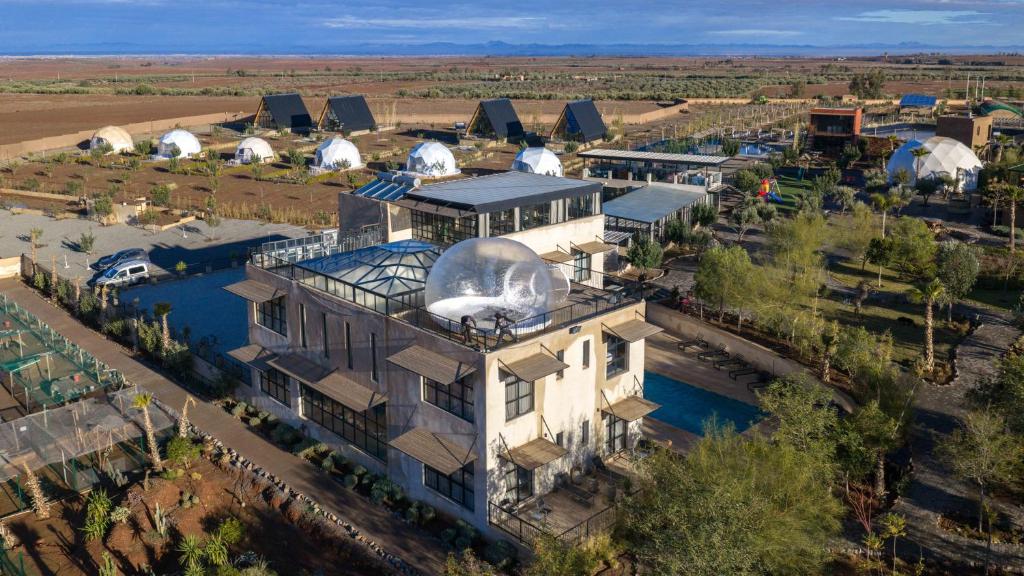 an overhead view of a large building with a large observatory at The Ranch Resort in Marrakech