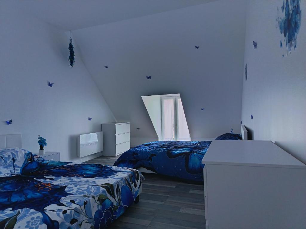 Postel nebo postele na pokoji v ubytování Village préféré des français ferrieres en Gâtinais