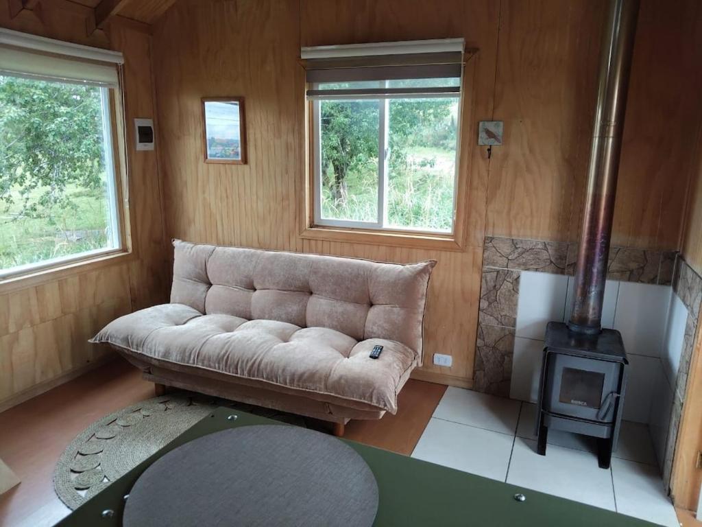 Et opholdsområde på La petite cabane de Putemun