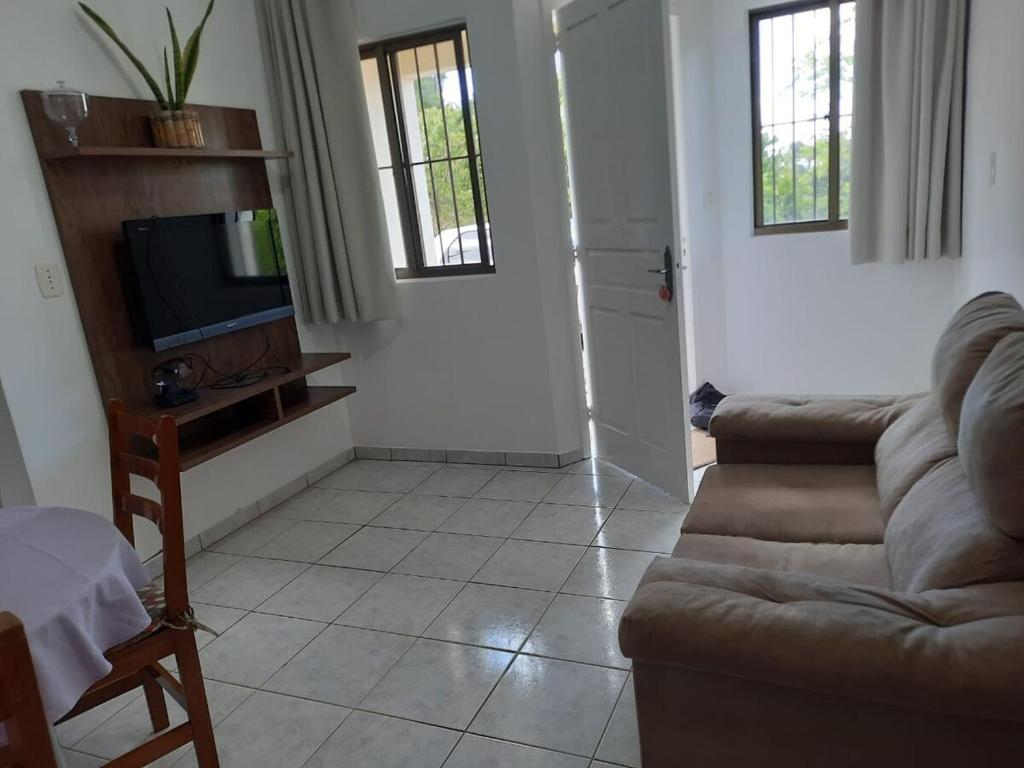 Et tv og/eller underholdning på Pousada Casa Rosa