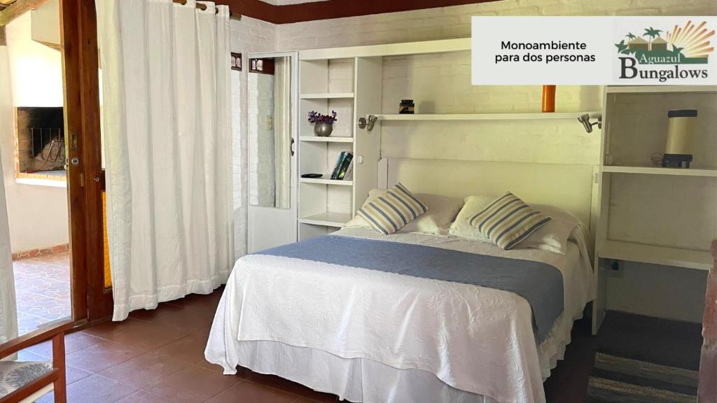 En eller flere senge i et værelse på Studio superior con vistas al jardin