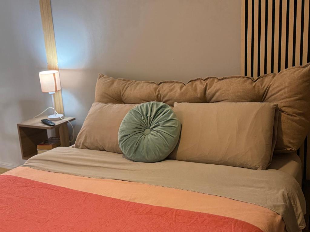 En eller flere senge i et værelse på Casa M Villa Alemana