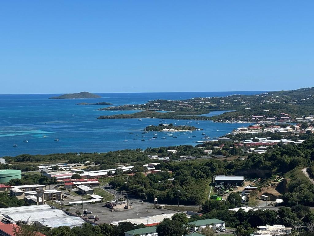 an aerial view of a town and a body of water at CARIBBEAN SPLENDOR WITH MILLION DOLLAR VIEWS in Christiansted