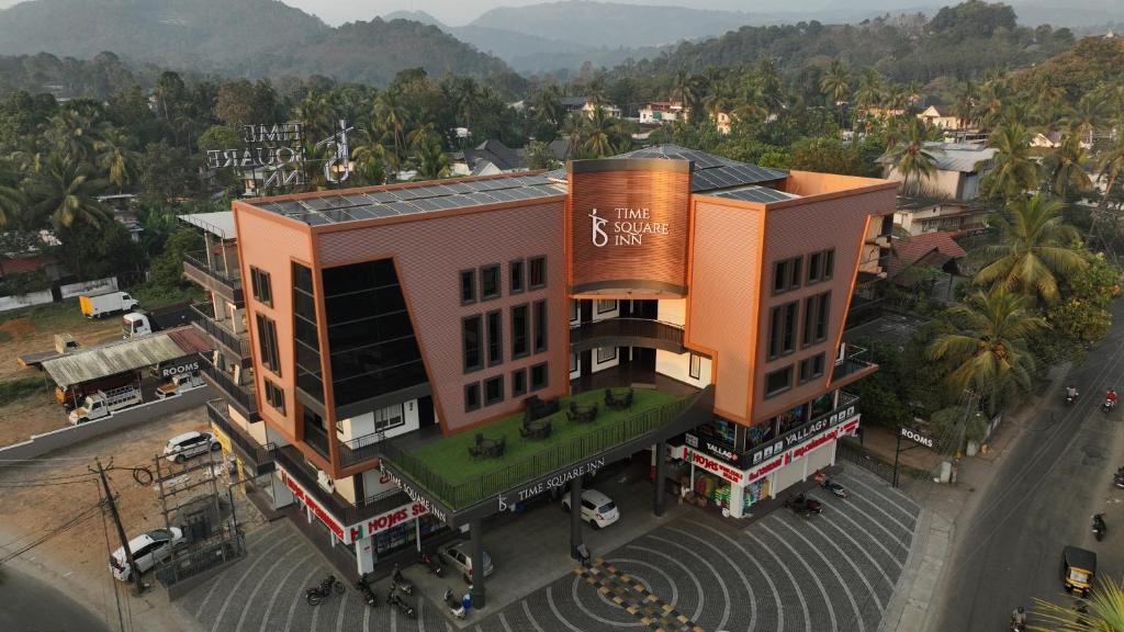 an overhead view of a building on a street at Time Square Inn in Erāttupetta