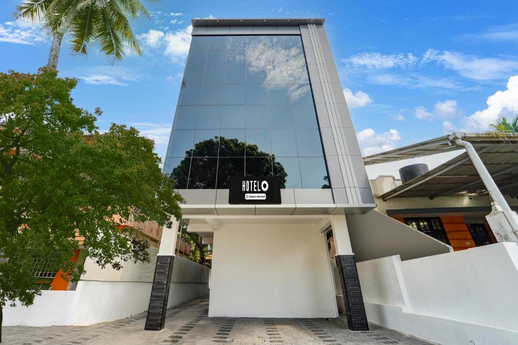 a building with a sign that reads lifeo at Hotel O HMT Colony Kochi Formerly Pullans Arcade in Cochin