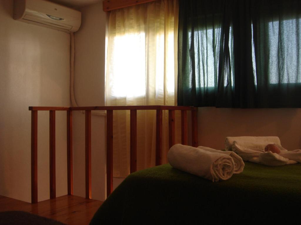 Postel nebo postele na pokoji v ubytování Pension Niki