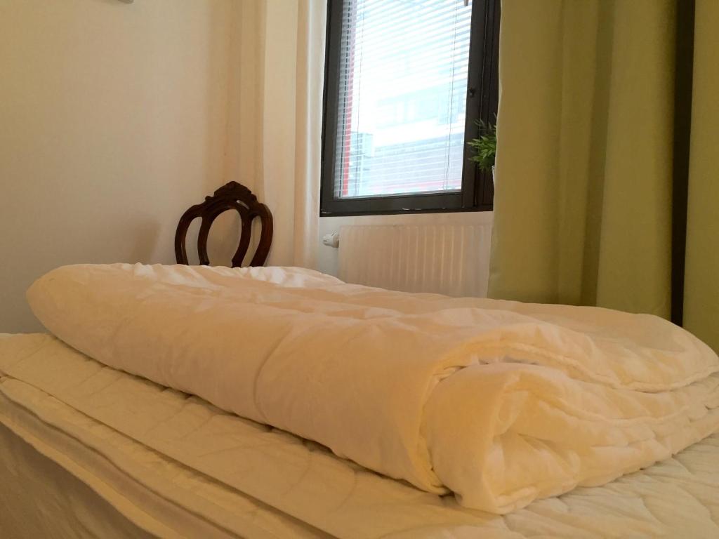 Postel nebo postele na pokoji v ubytování Linné Hostel