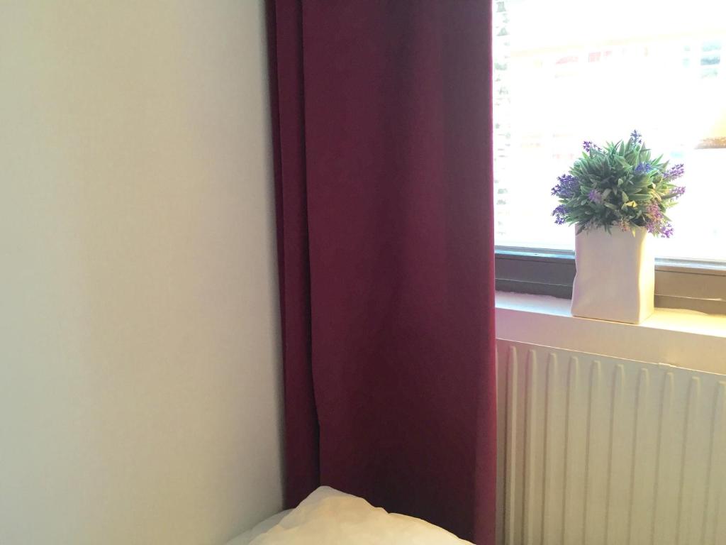 Postel nebo postele na pokoji v ubytování Linné Hostel