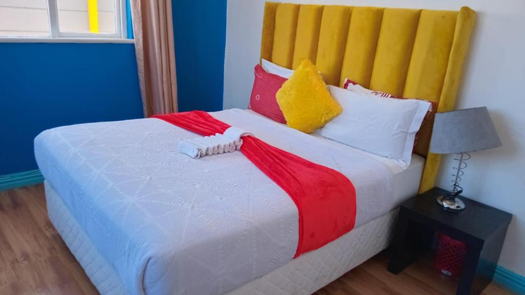 En eller flere senge i et værelse på Neo & ruks guest houses Boston Belleville 4