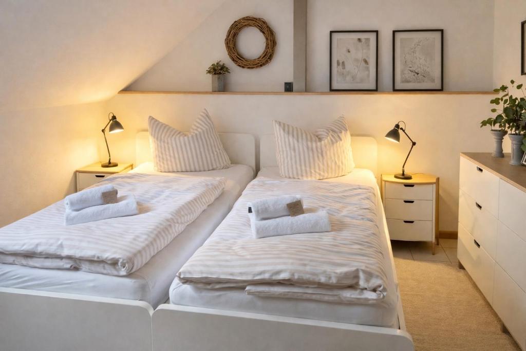 Giường trong phòng chung tại Weberhof - Münster 6