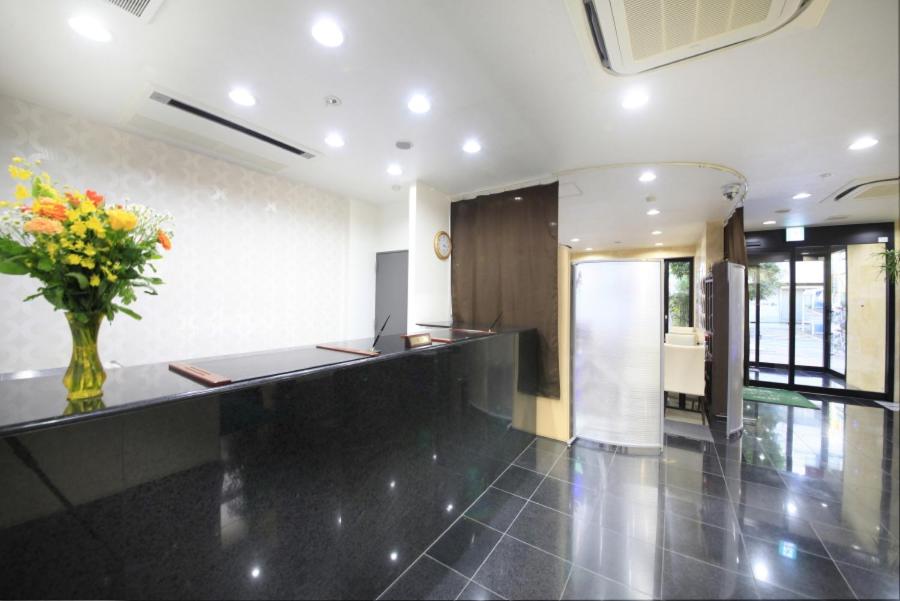 Kuchyň nebo kuchyňský kout v ubytování Fuchu Urban Hotel Annex