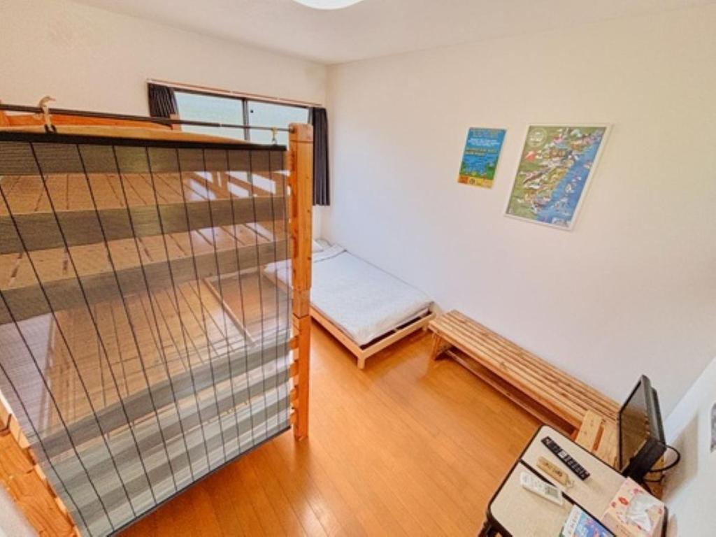 Giường trong phòng chung tại ＬＯＤＧＥ ｎ"ｔｒｉｂｅ - Vacation STAY 79114v