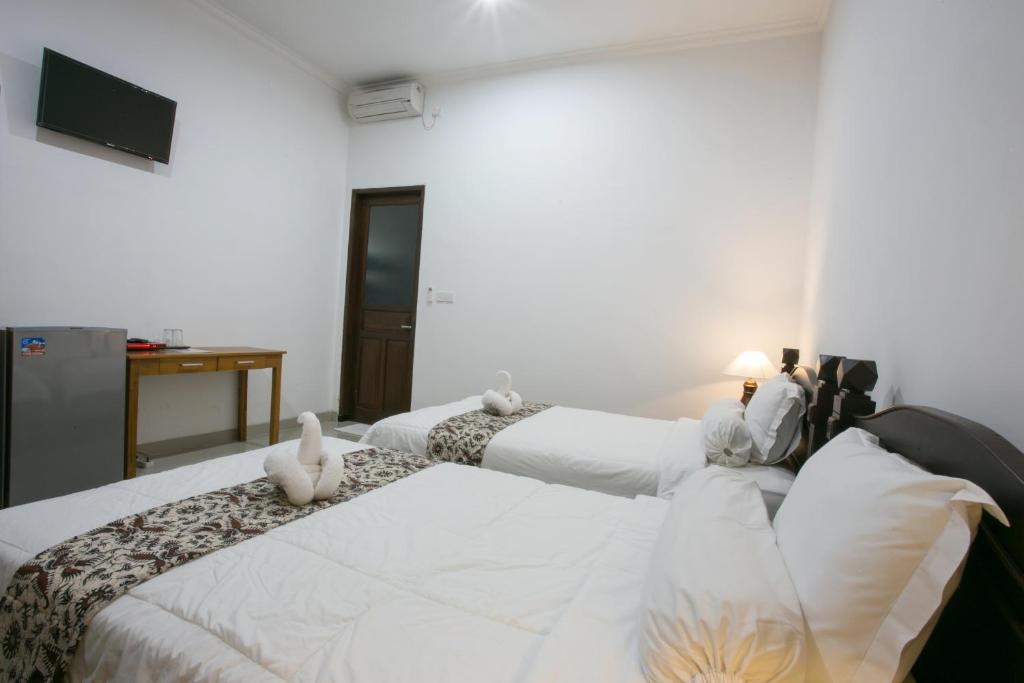 Wijaya Guesthouse - Chambre Jumelée
