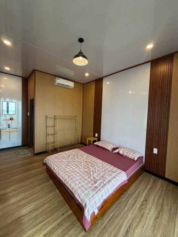 a large bedroom with a large bed in it at Bai Thom Retreat in Phú Quốc