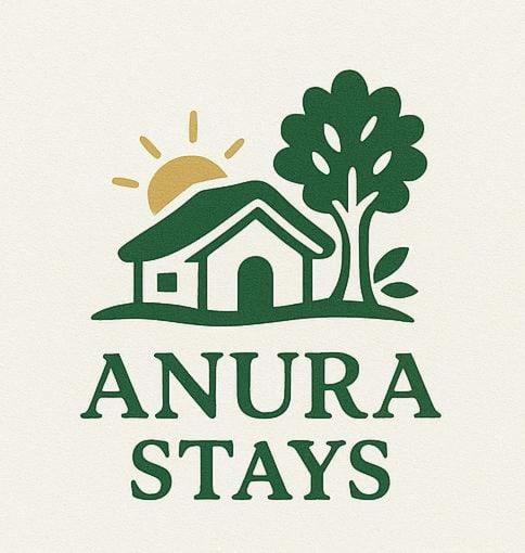 a logo of a house and a tree at Anurastays in Mudigere