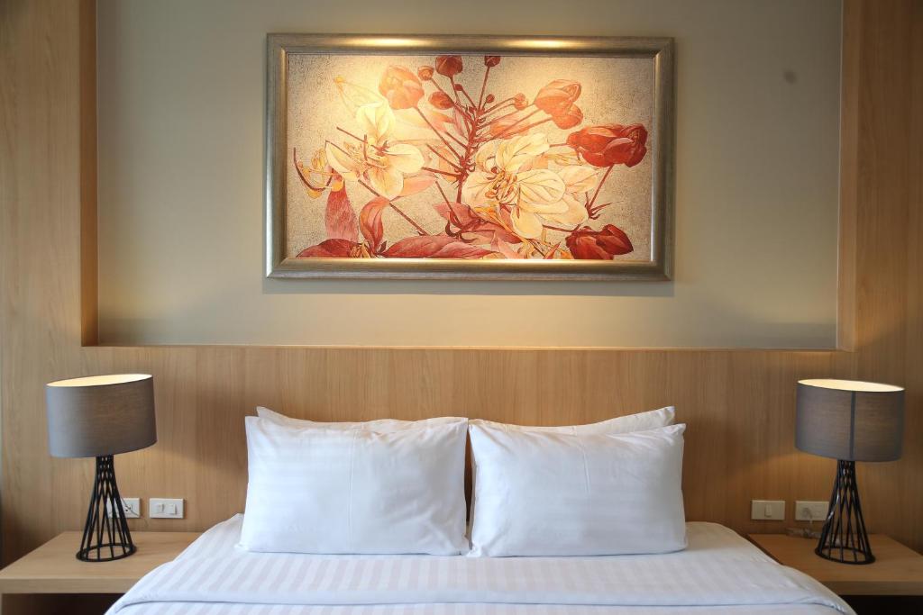 Uma cama ou camas num quarto em PP Charlie Beach Resort