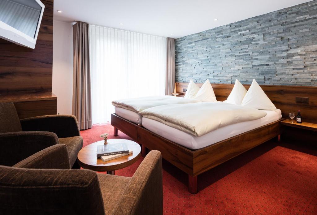 Postel nebo postele na pokoji v ubytování Hotel Continental