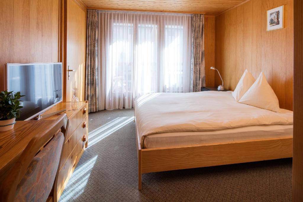 Postel nebo postele na pokoji v ubytování Hotel Continental