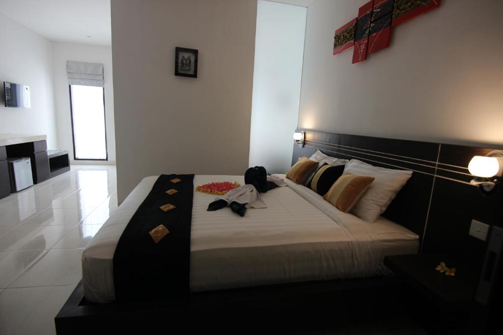 Postel nebo postele na pokoji v ubytování The Diana Suite