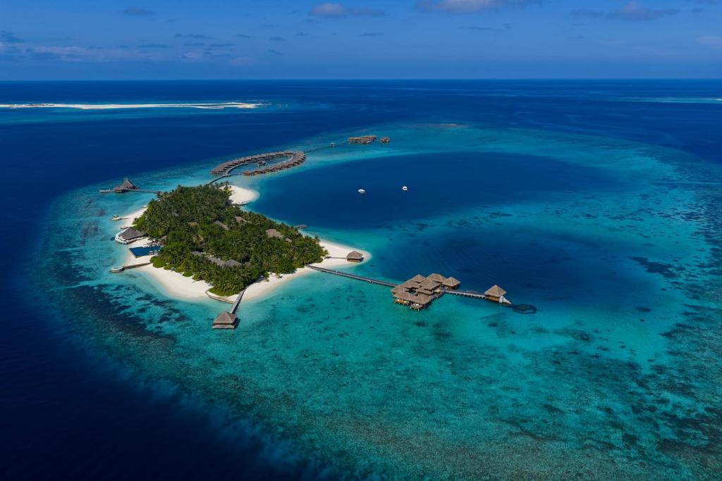 an island in the middle of the ocean at Huvafen Fushi Maldives in Nakachchafushi