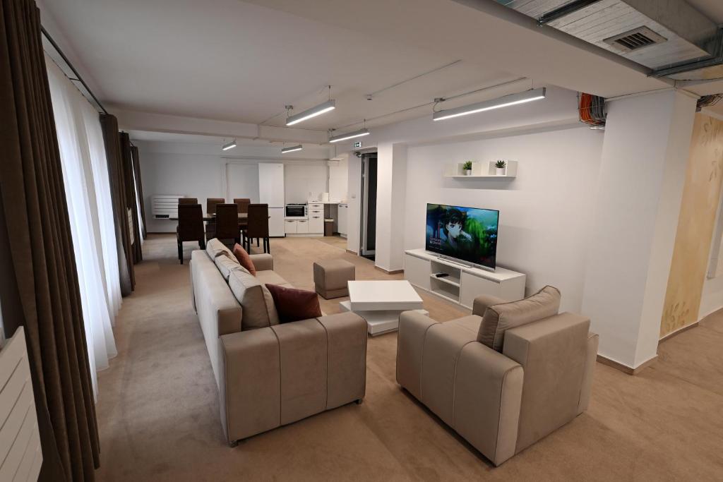 Et tv og/eller underholdning på Alexandar Square Suites