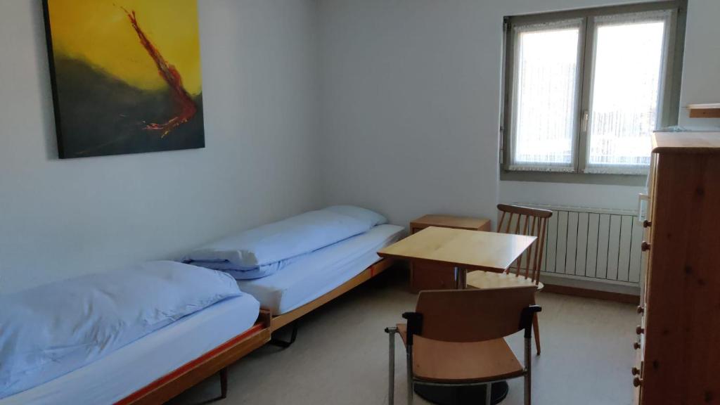 Krevet ili kreveti u jedinici u okviru objekta Unterkunft Zwisa