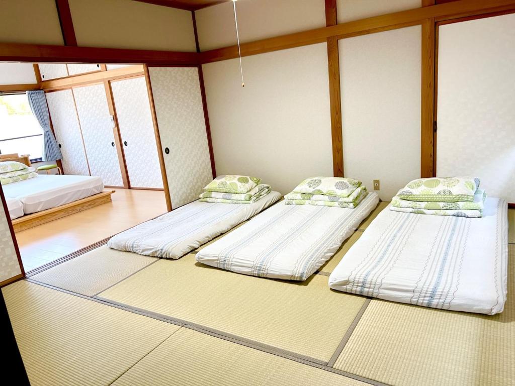 Postel nebo postele na pokoji v ubytování Minnpaku nami - Vacation STAY 60554v