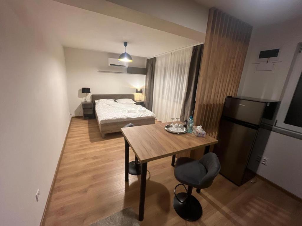 Giường trong phòng chung tại Mario Studio Craiova