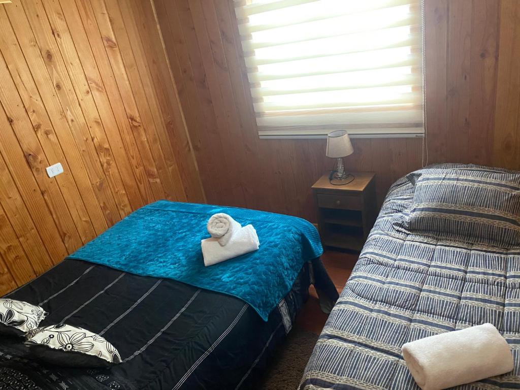 Giường trong phòng chung tại Cabaña jazmin