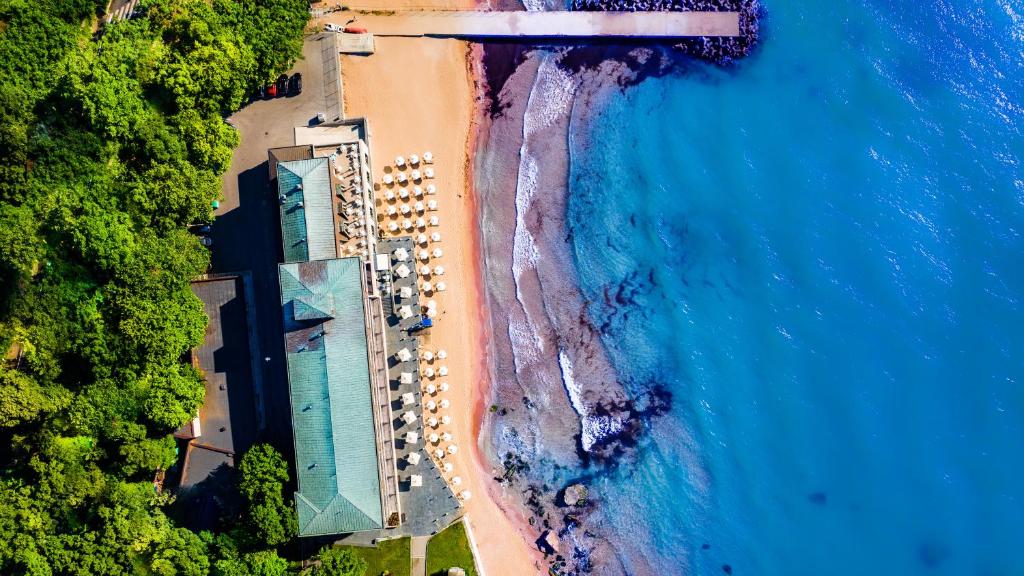 an overhead view of a beach with condos and the ocean at HVD Nympha Hotel - Adults Only - Private Beach & Free Parking in Golden Sands