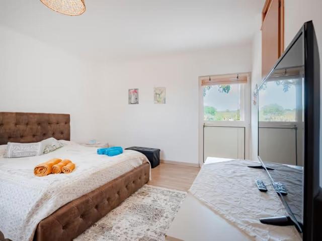 En eller flere senge i et værelse på Camera matrimoniale con bagno