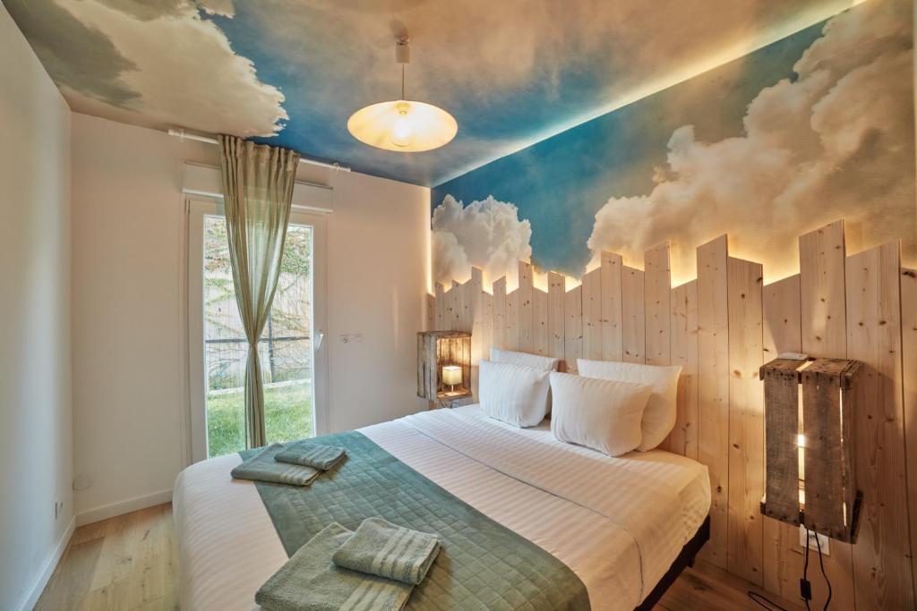 En eller flere senge i et værelse på 3p - 70m2 CAPUCINE au calme avec jardins