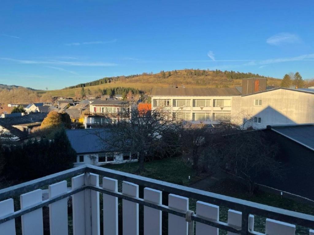 a view of a city from a balcony at Ferienwohnung Hoher Pön in Willingen
