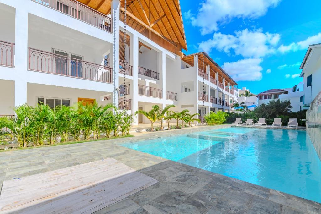 Swimmingpoolen hos eller tæt på Loft Moderno a Pasos de la Playa con Piscina by Caribbean Paradise Rentals