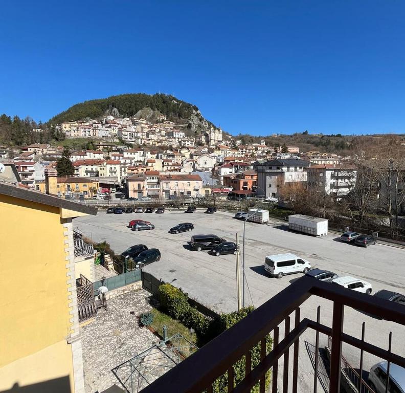 a view of a parking lot with cars parked at Mely House centralissimo in Castel di Sangro