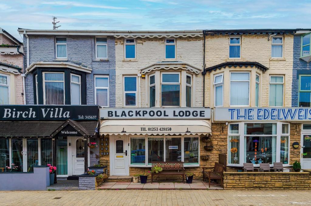 a building with a blackpool lodge on a street at Blackpool Lodge in Blackpool