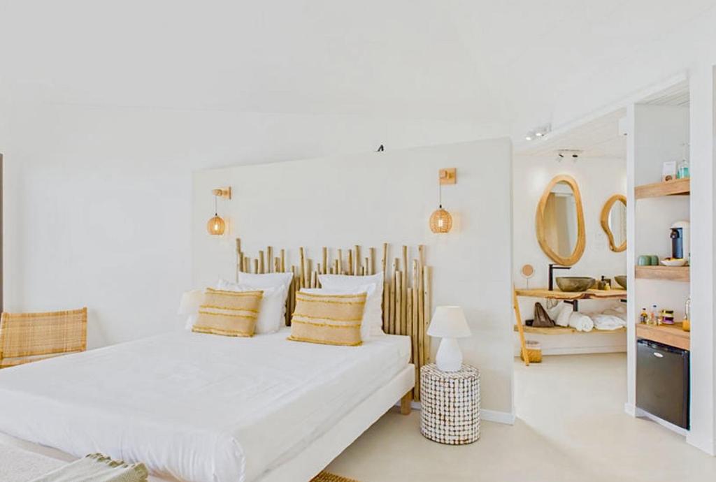 Postel nebo postele na pokoji v ubytování Amnios