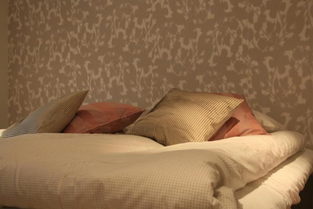 Postel nebo postele na pokoji v ubytování Flygplatshotellet