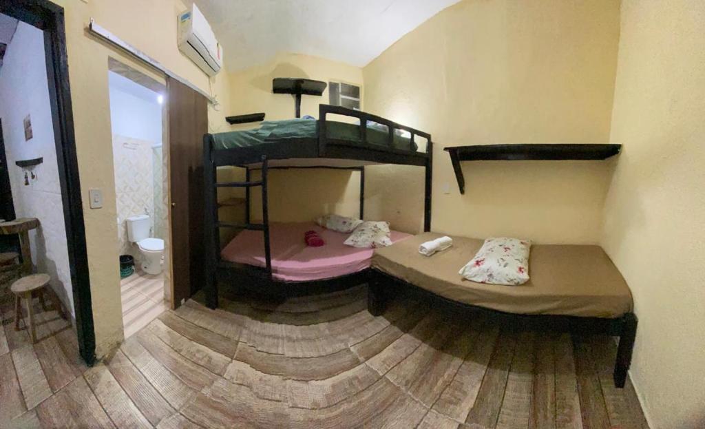 En eller flere senge i et værelse på Casa Wilson