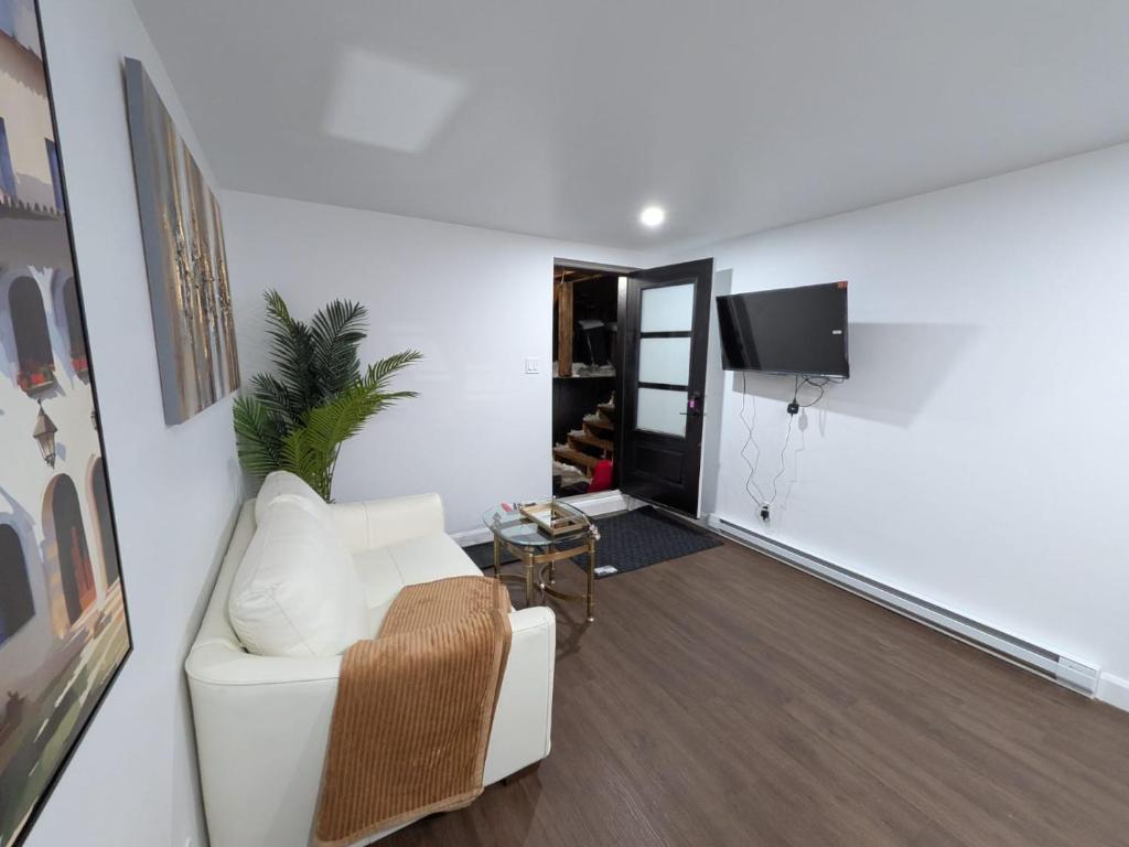 TV a/nebo společenská místnost v ubytování Motel LA RÉFÉRENCE