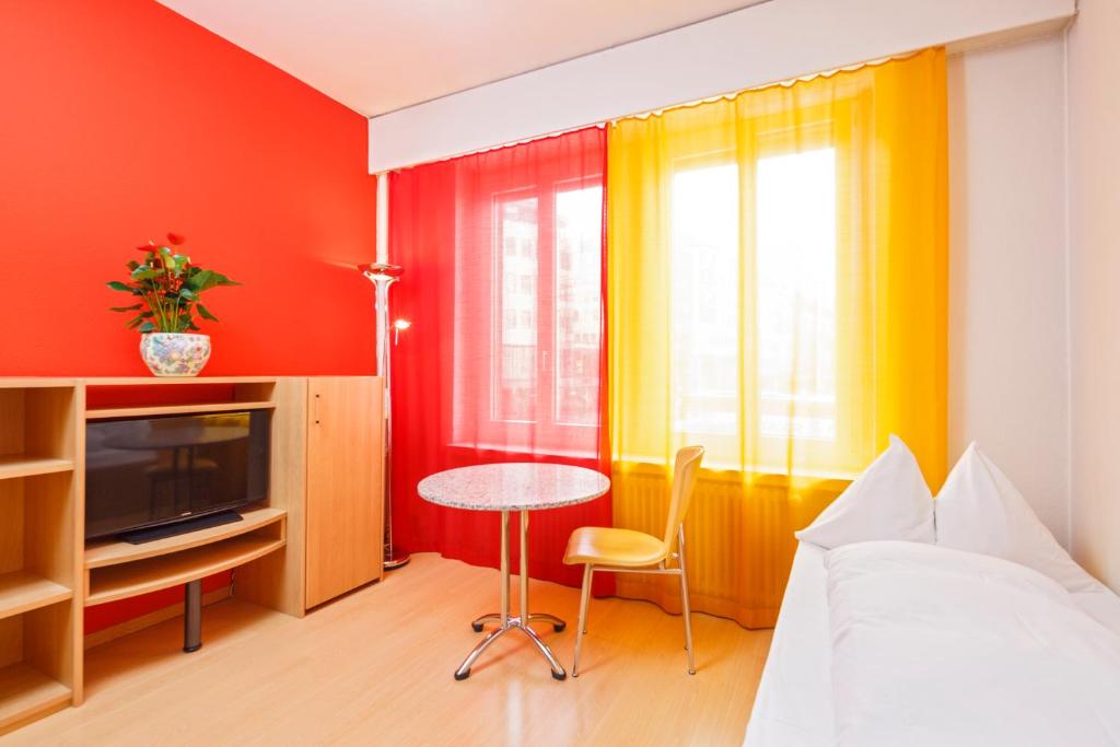 TV a/nebo společenská místnost v ubytování Residence zum Löwen