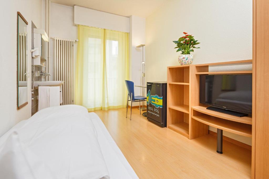 Postel nebo postele na pokoji v ubytování Residence zum Löwen