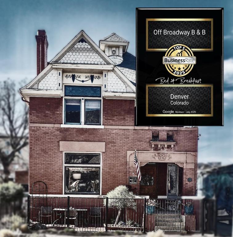 a building with a sign in front of it at Off Broadway B & B in Denver