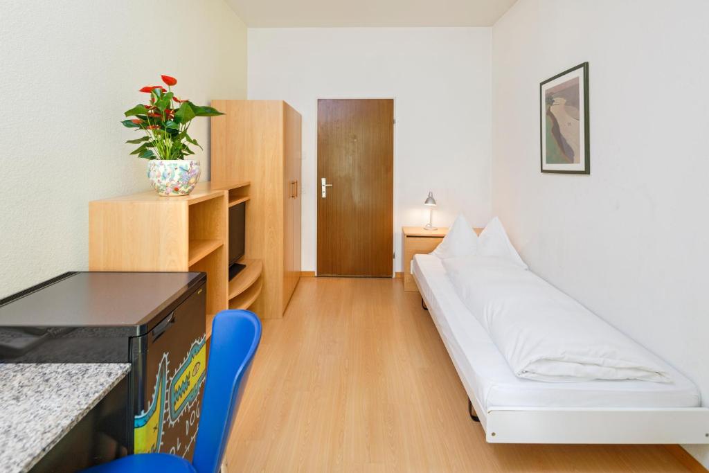 Postel nebo postele na pokoji v ubytování Residence zum Löwen