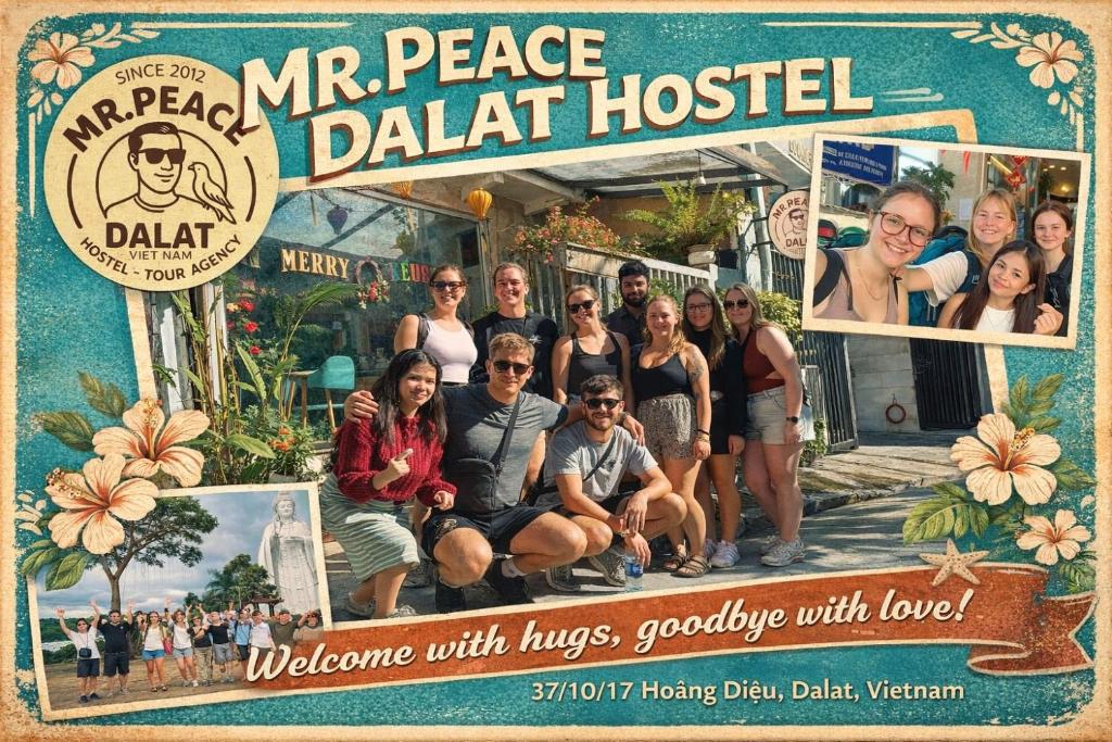 a group of people posing for a picture in front of a hotel at Dalat Peace Backpackers Hostel in Da Lat