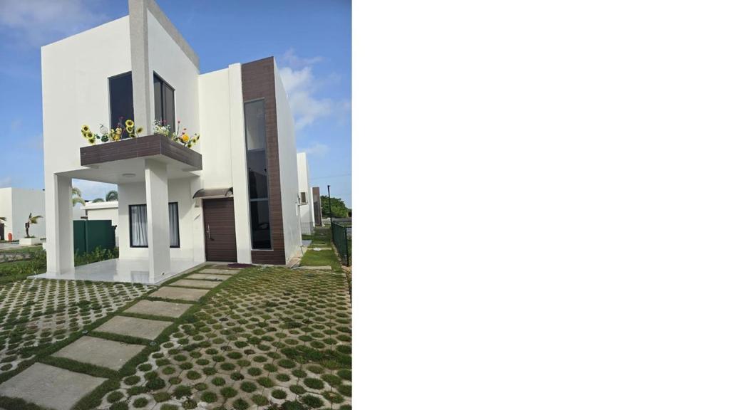 eine Darstellung eines Hauses mit Balkon in der Unterkunft Beutiful New Villa In Punta Cana in Punta Cana