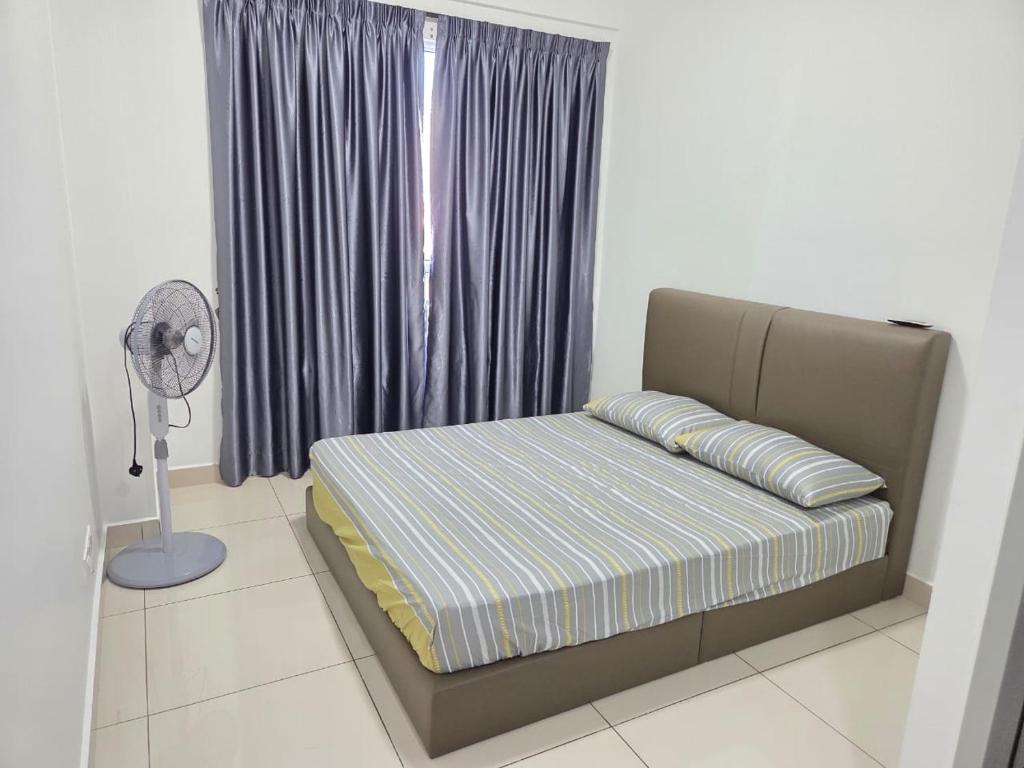 Postel nebo postele na pokoji v ubytování 3BR Condo near Queensbay, Penang